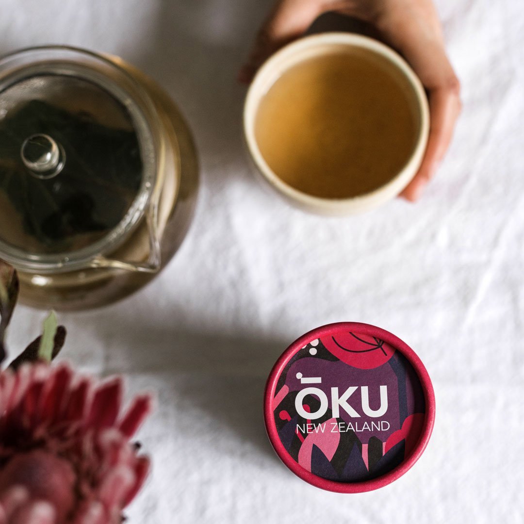 OKU Restore tea brewed in a cup