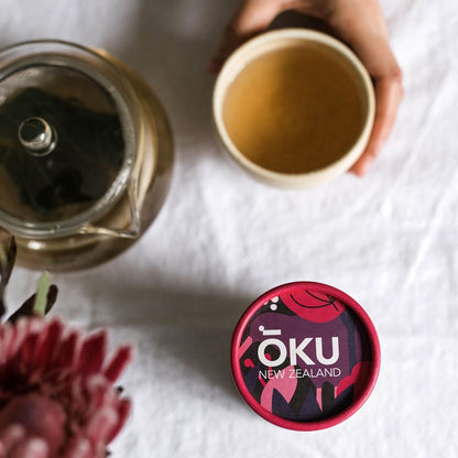 OKU Restore tea brewed in a cup